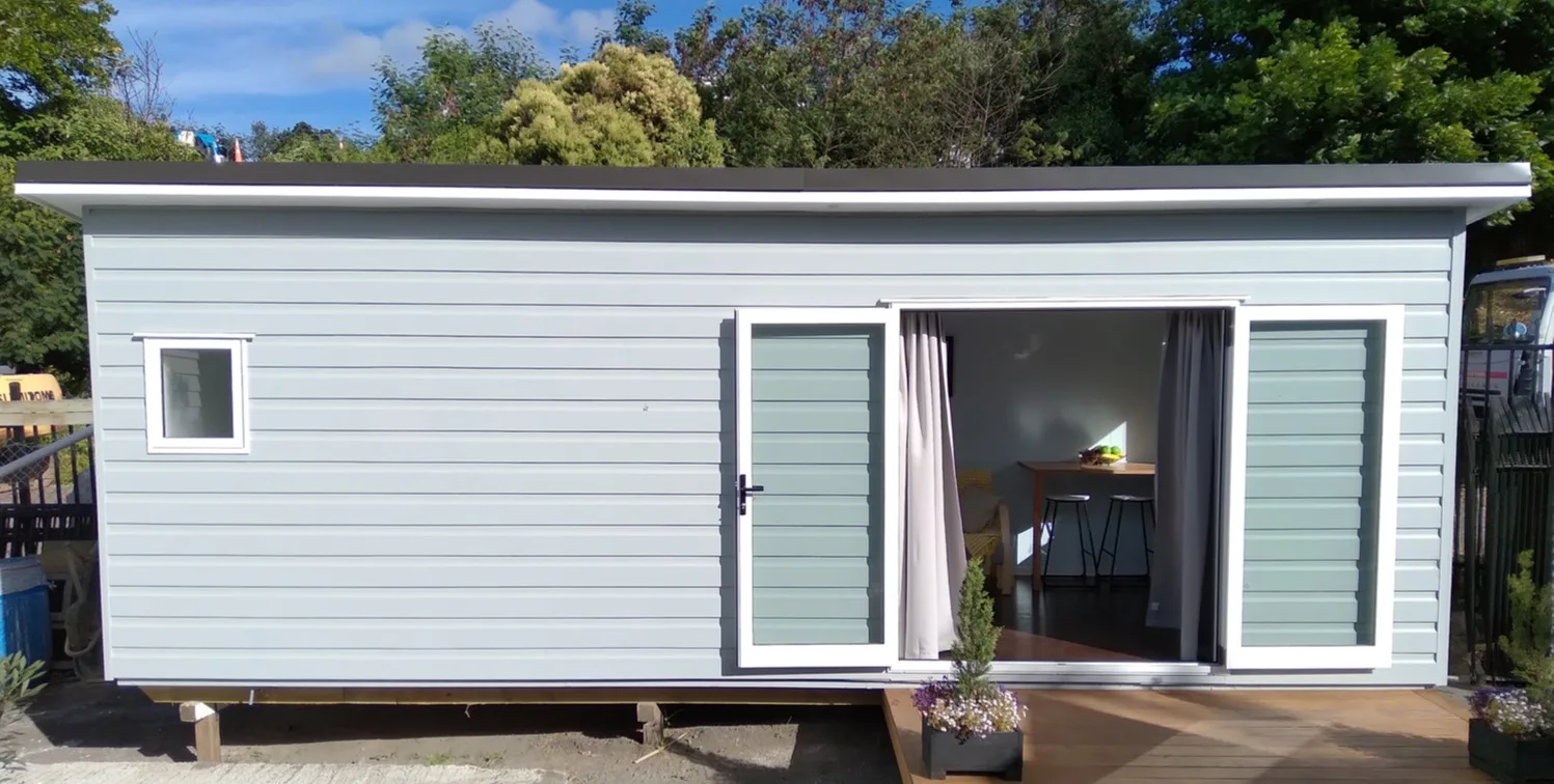 Light-clad KDL home with french doors open to the garden