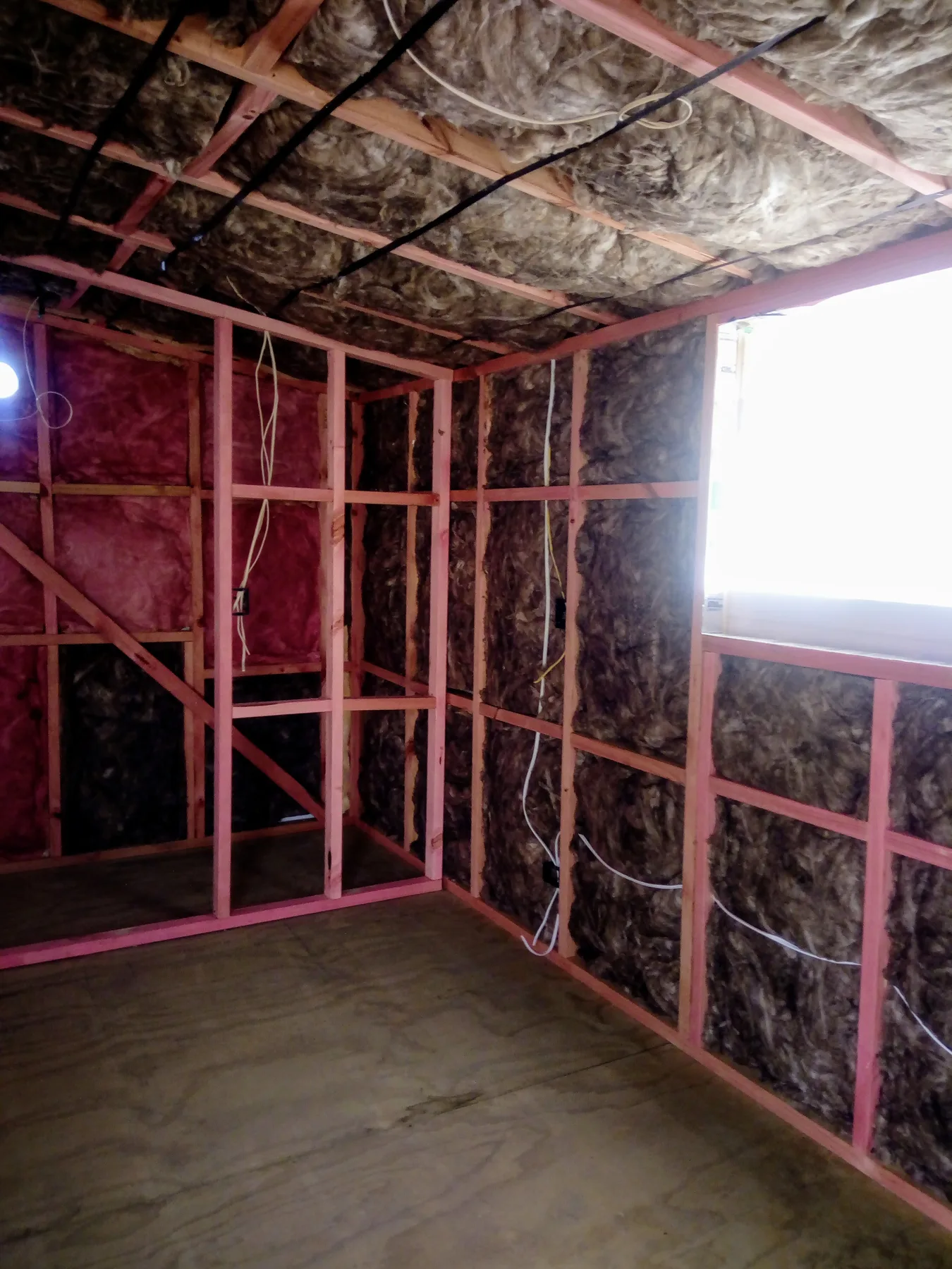 Timber framing and insulation inside a KDL build before lining goes on