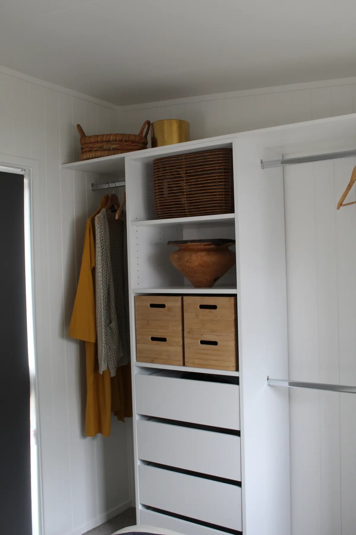Built-in wardrobe and shelving framed and partly lined