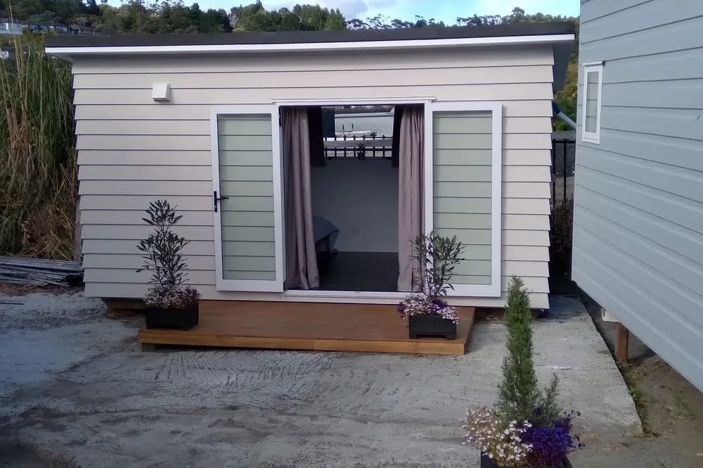 KDL self-contained cabin with deck and french doors